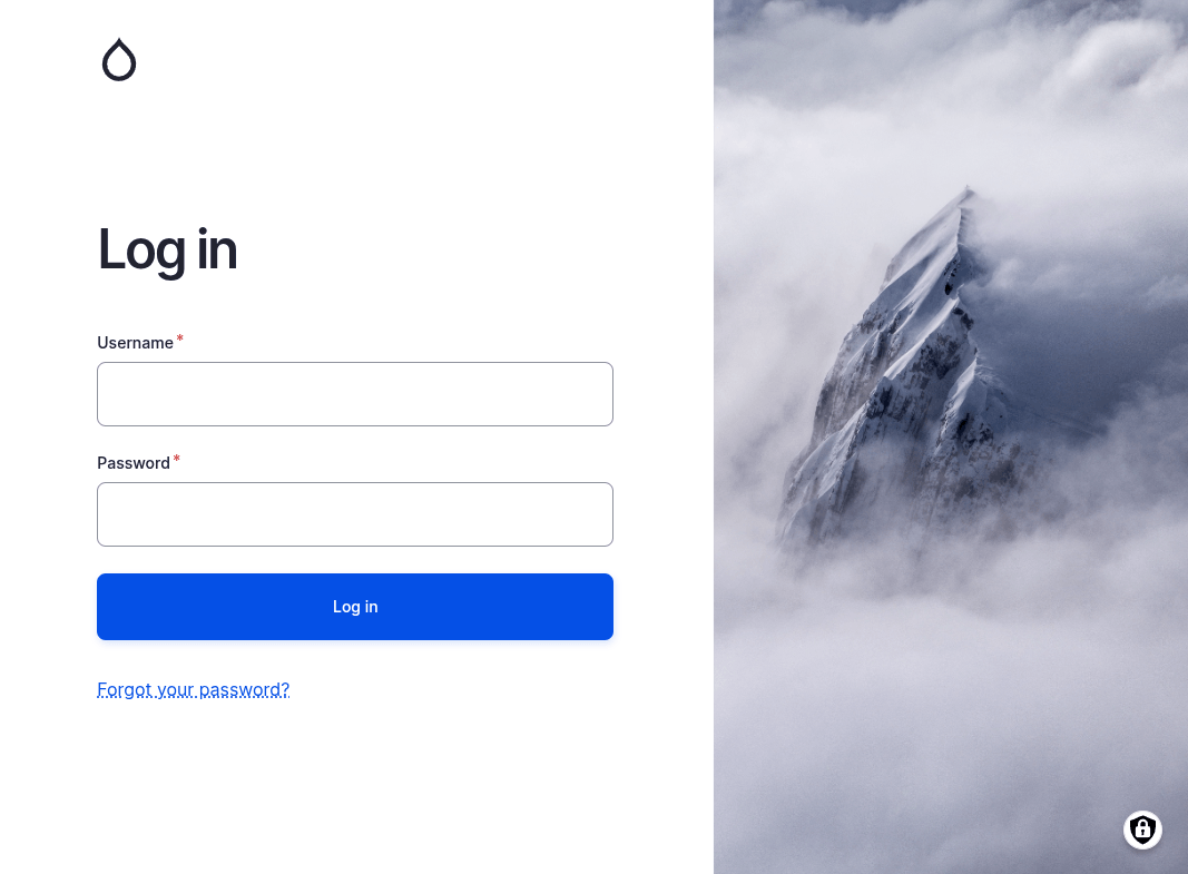 The Local Gov Drupal login form. Showing the username and password fields on the left and a pleasing mountaintop image on the right.
