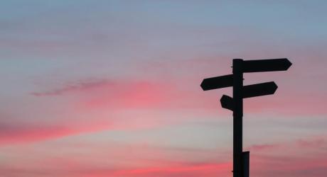 Sign posts pointing in opposite directions